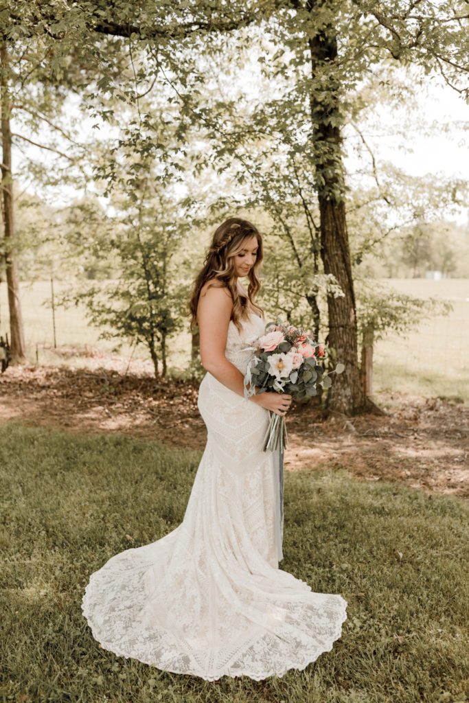 Outdoor bridal portraits with lace gown